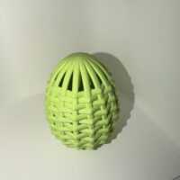 3d gedrucktes deko ei im geflochtenen korb design – frühlingsdekoration